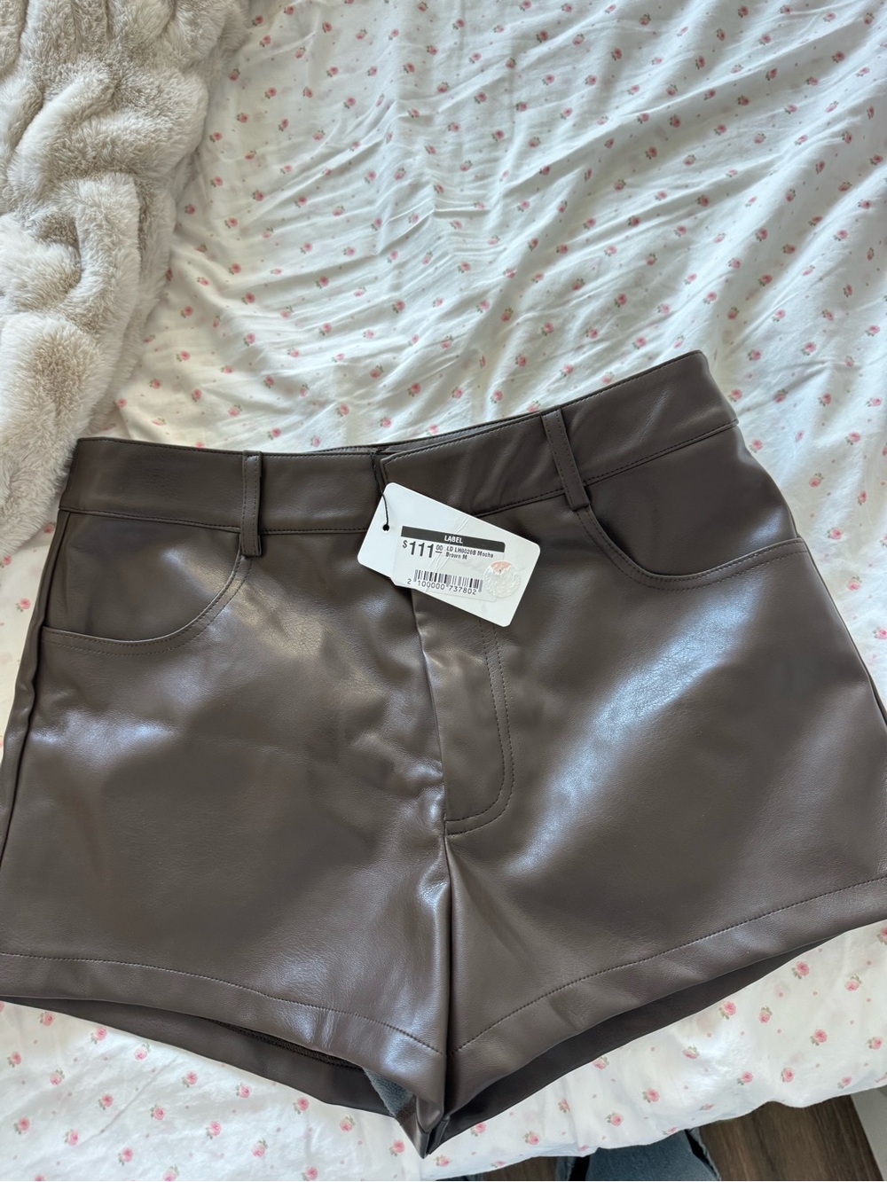 Line and Dot leather shorts